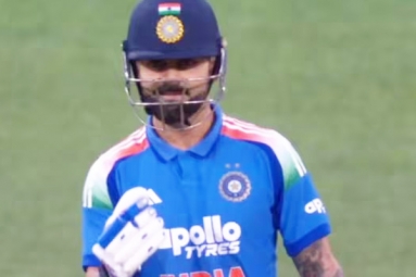 Virat Kohli smiles after scoring first run in Australia Tour
