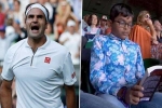 Indian origin boy reading book in Wimbledon 2019 Clash of Tennis, indian boy in Wimbledon 2019 Clash of Tennis, roger federer vs rafael nadal semi final indian origin boy seen engrossed in his book during wimbledon 2019 clash of tennis, Rafael nadal