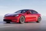 Tesla, Tesla new electric car launch, tesla to launch electric hatchback without a steering wheel, Tesla car without steering
