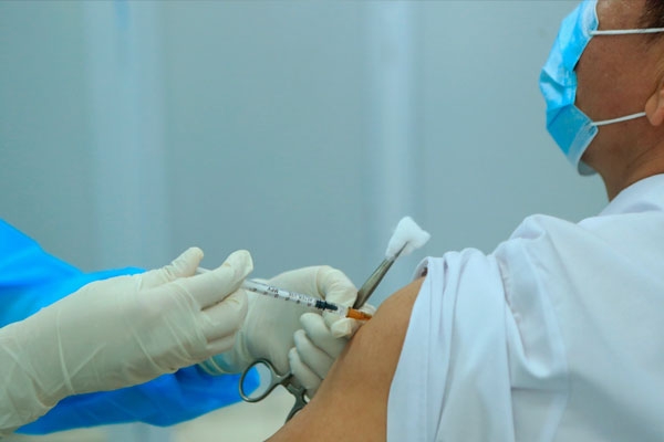 New Zealand plans to buy vaccines for the entire population